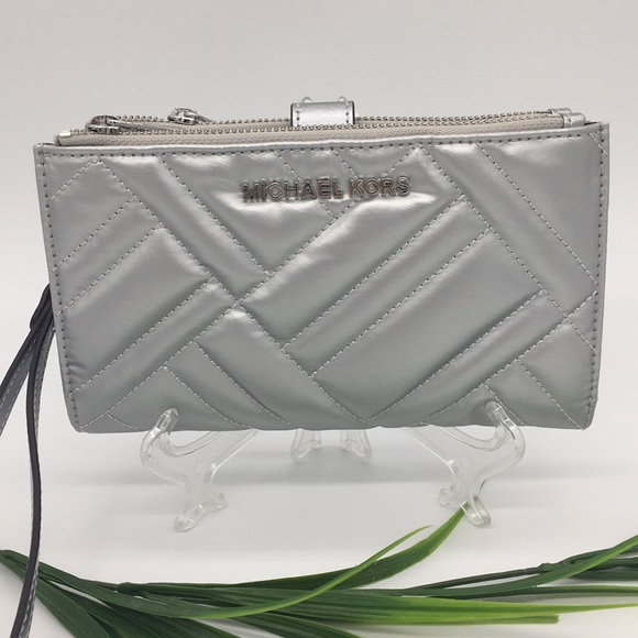 Michael Kors Handbags - Michael Kors Peyton Silver LG Double Zip Wristlet